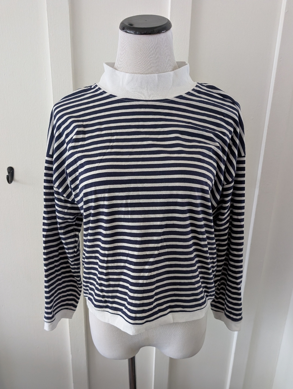 Rivet And Thread Mock Neck Top